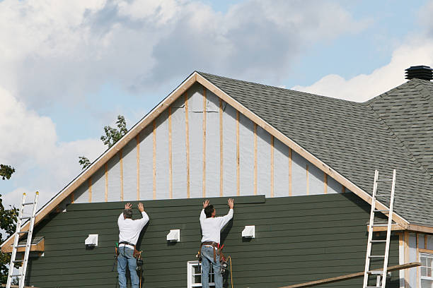 Professional Storm Damage Siding Repair technician working in Brinklow, MD